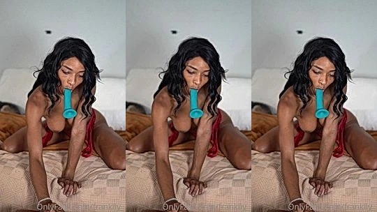 freaky horny ebony slut Frankiiy playing with her dildo inside her mouth naked